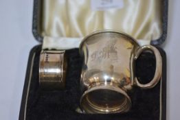 A George VI cased christening set of mug and napkin ring (lacking spoon), Sheffield 1938 and 1939,