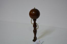 A 19th century turned rosewood bilboquet (cup and ball game), of characteristic form. 17cm