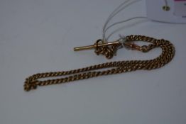 A 9ct gold Albert watch chain, with t-bar and twin lobster clasps on a curblink chain. 25 grams