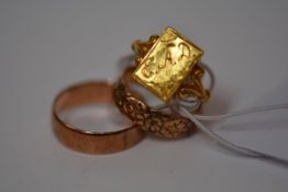 Two 9ct gold wedding bands; together with an Indian yellow metal ring (unmarked). Total 8.6 grams