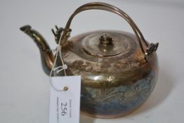 A Chinese silver teapot in the Qing taste, 19th century, with twin loop handles, the cover with