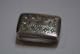 A William IV silver vinaigrette, Nathaniel Mills, Birmingham 1837, of rectangular form, the cover