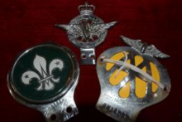 A group of three car badges comprising: AA, with member's number; Civil Service Motoring