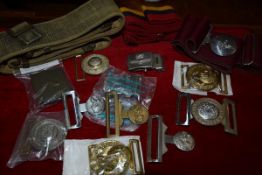 A group of military belt buckles including a Royal Army Medical Corps with canvas belt, Parachute