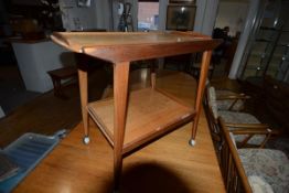 A 1970's/80's Remploy teak two tier tea trolley