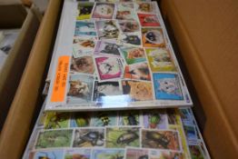 A box with a group of thematic stamp packs