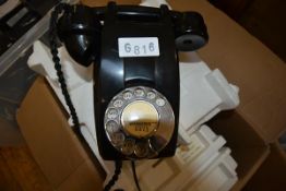 A vintage black bakelite telephone (converted)