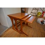 A nest of three 1970's/80's teak occasional tables