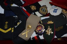 A group of military, police and security cloth badges, epaulettes etc including Logistics Corps, The