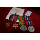 A World War II group of four medals: The War Medal, The Defence Medal, The Burma Star and the 39-