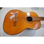 A vintage Terada (Japan) acoustic six-string guitar, with paper label, no. 1200, with carrying