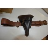 A German Luger holster, stamped Auweter & Bubek, dated 1936 together with a Sam Brown belt (2)