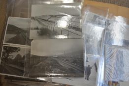 A group of black and white railway photographs and postcards