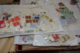 A box of mixed stamps in packets and envelopes, GB, Netherlands and South Africa