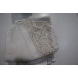 A group of late 19th/early 20th century cloths comprising a table cloth with deep crochet border,