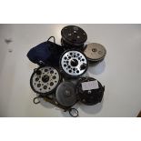 A group of fishing reels including Young & Sons Beaudex, Pridex, Condex and brass spring scales (7