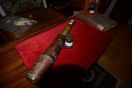 A brass four draw telescope, Broadhurst Clarkson & Co,, 63 Farringdon Road, London E.C., in a