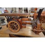 A large carved wooden model of a steam traction engine, length 72cm
