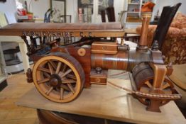 A large carved wooden model of a steam traction engine, length 72cm