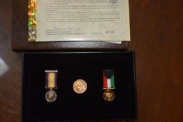 A Gulf War Collection cased commemorative gold sovereign, "Behind Enemy Lines", a full sovereign