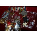 A group of medals, military and civilian, including a World War II group including the Africa