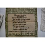 An early 19th century sampler, worked in green and black threads by Isabella Gowan, Whitehaven,