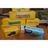 A group of seven boxed Dinky diecast models including B.O.A.C. coach, no. 283; together with a boxed