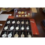 A collection of Atlas Heritage reproduction pocket watches, with boxes and in display cases together