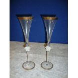 Pair of Rosenthal GB2 Versace Medusa d'Or champagne flutes, 303mm tall, with a current retail