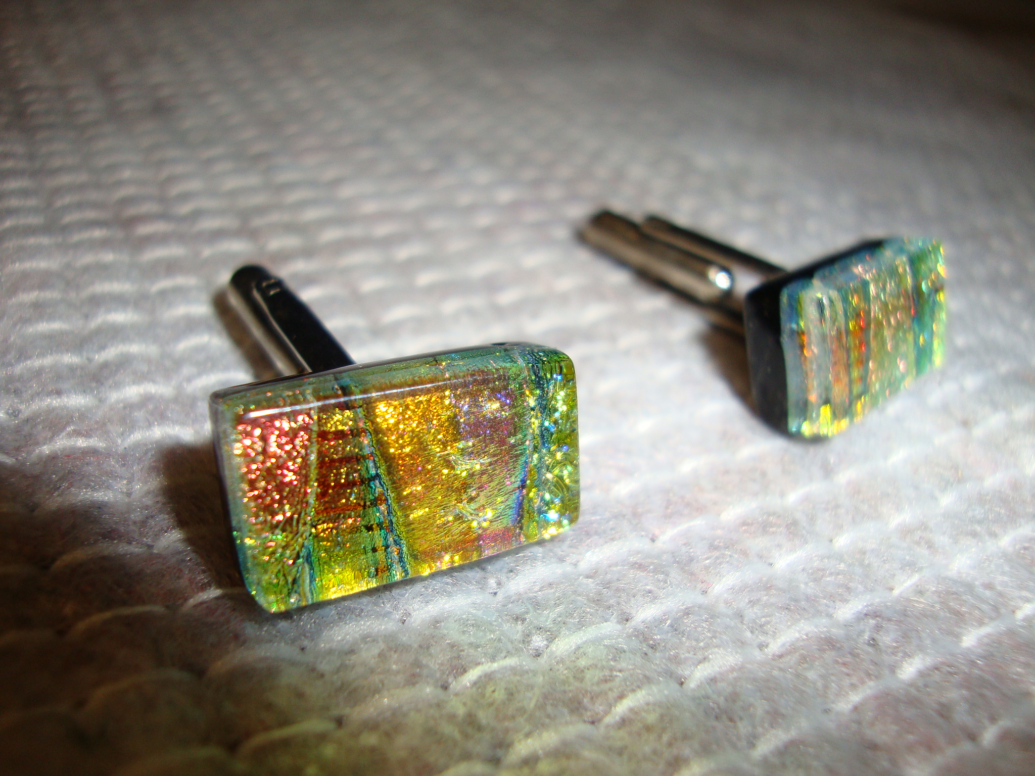 Pair of cufflinks understood to be handmade in glass