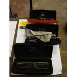 3 assorted pairs of Alain Mikli glasses each including a case, in one instance with a very light