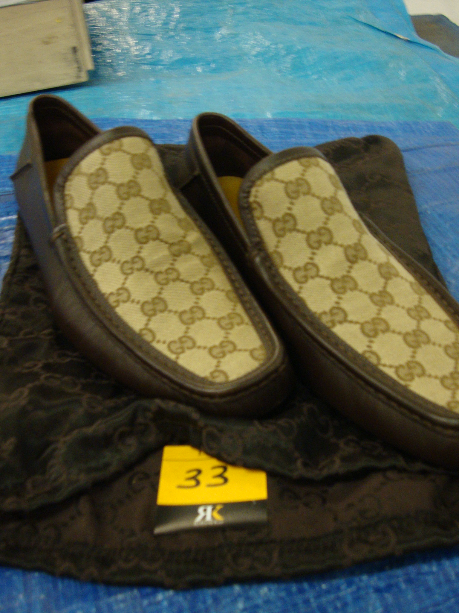 Pair of Gucci men's loafers/driving shoes in chocolate brown leather plus Gucci fabric upper. Size