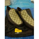 Pair of Gucci men's loafers/driving shoes in chocolate brown leather plus Gucci fabric upper. Size