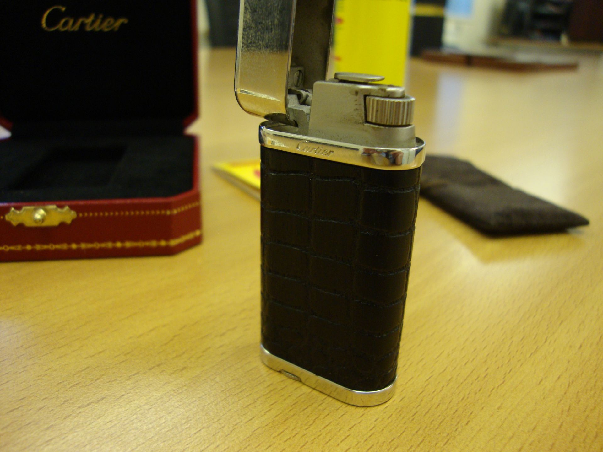 Cartier Lighter, in dark brown carved alligator skin style wood, with silver detailing. Serial - Image 7 of 11