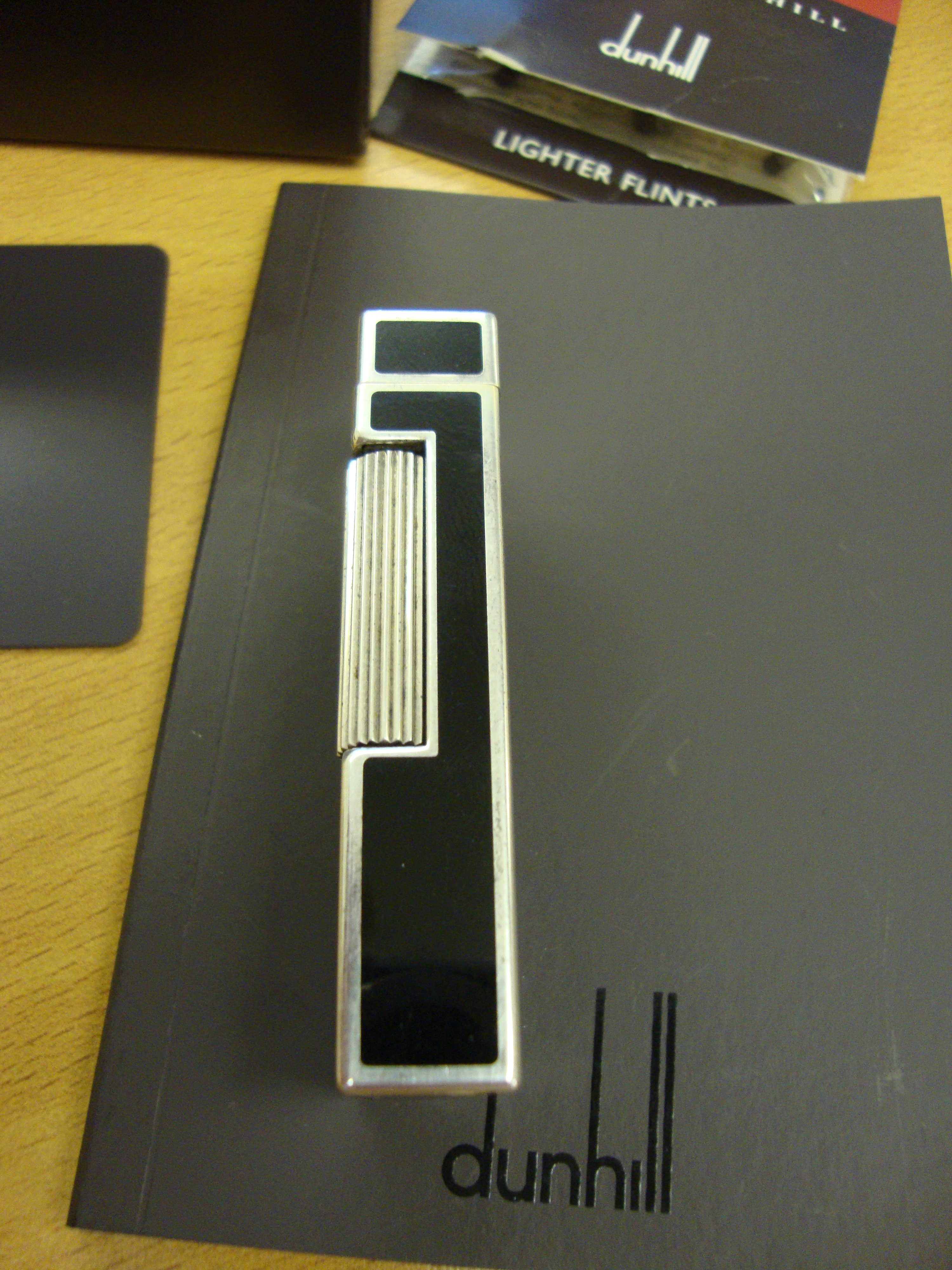 Dunhill rollagas lighter, model RL2301, in black laquer and silver, including box, book packs & - Image 6 of 12