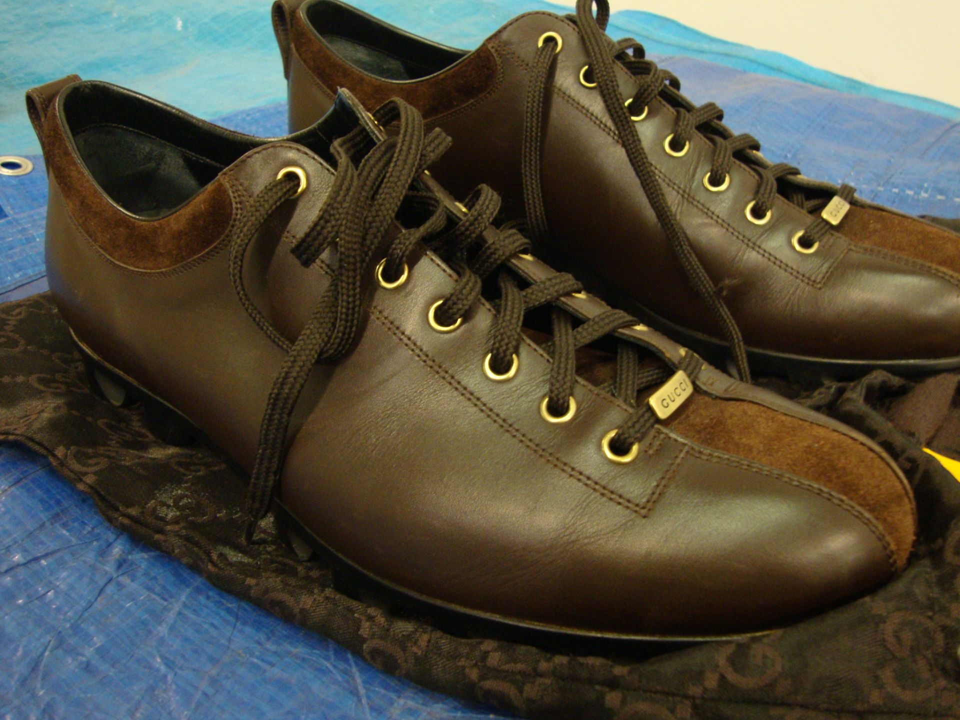 Pair of Gucci dark brown men's leather trainers size 46, with brown suede and gold trim, including - Image 2 of 4