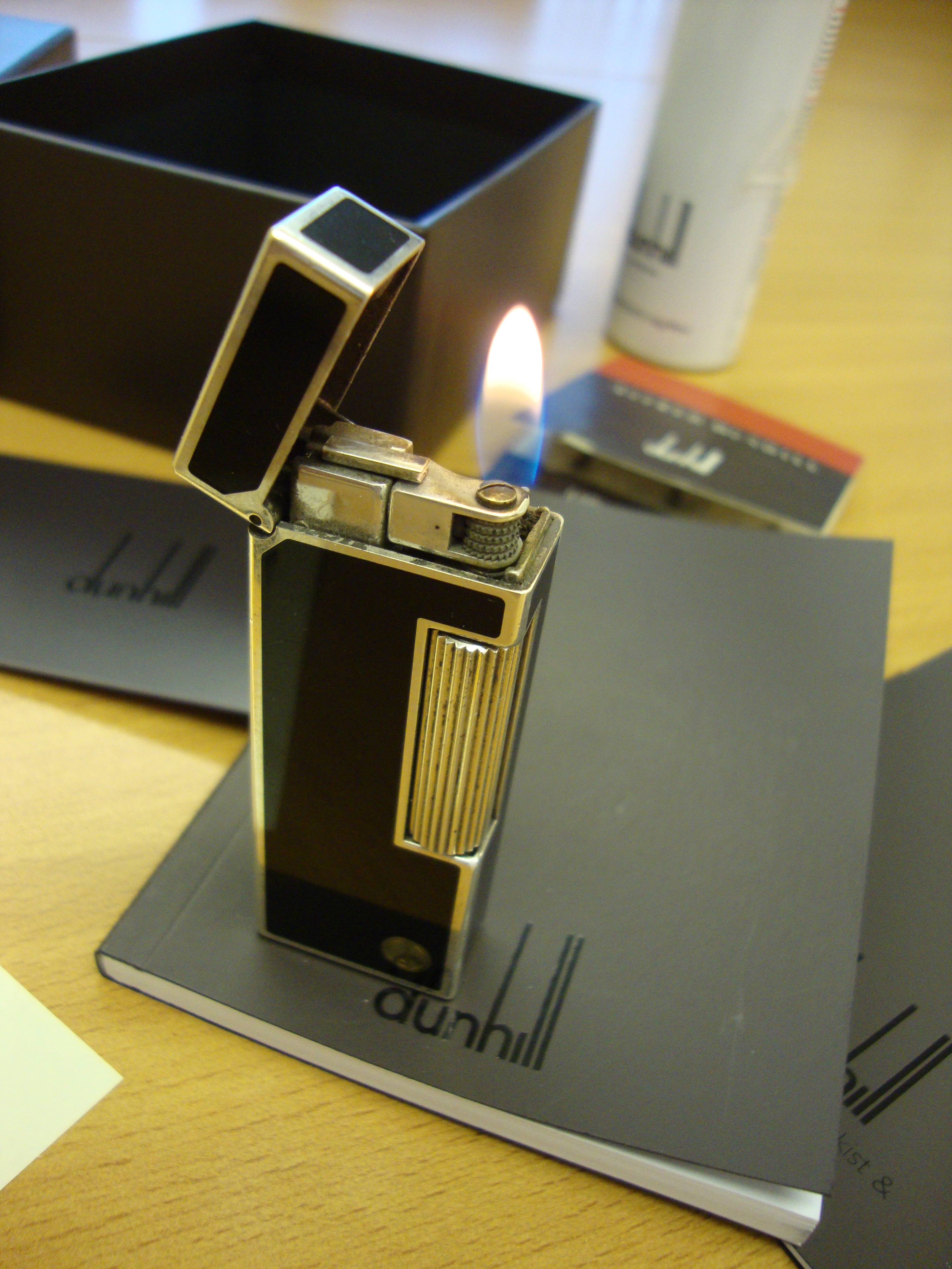 Dunhill rollagas lighter, model RL2301, in black laquer and silver, including box, book packs & - Image 2 of 12