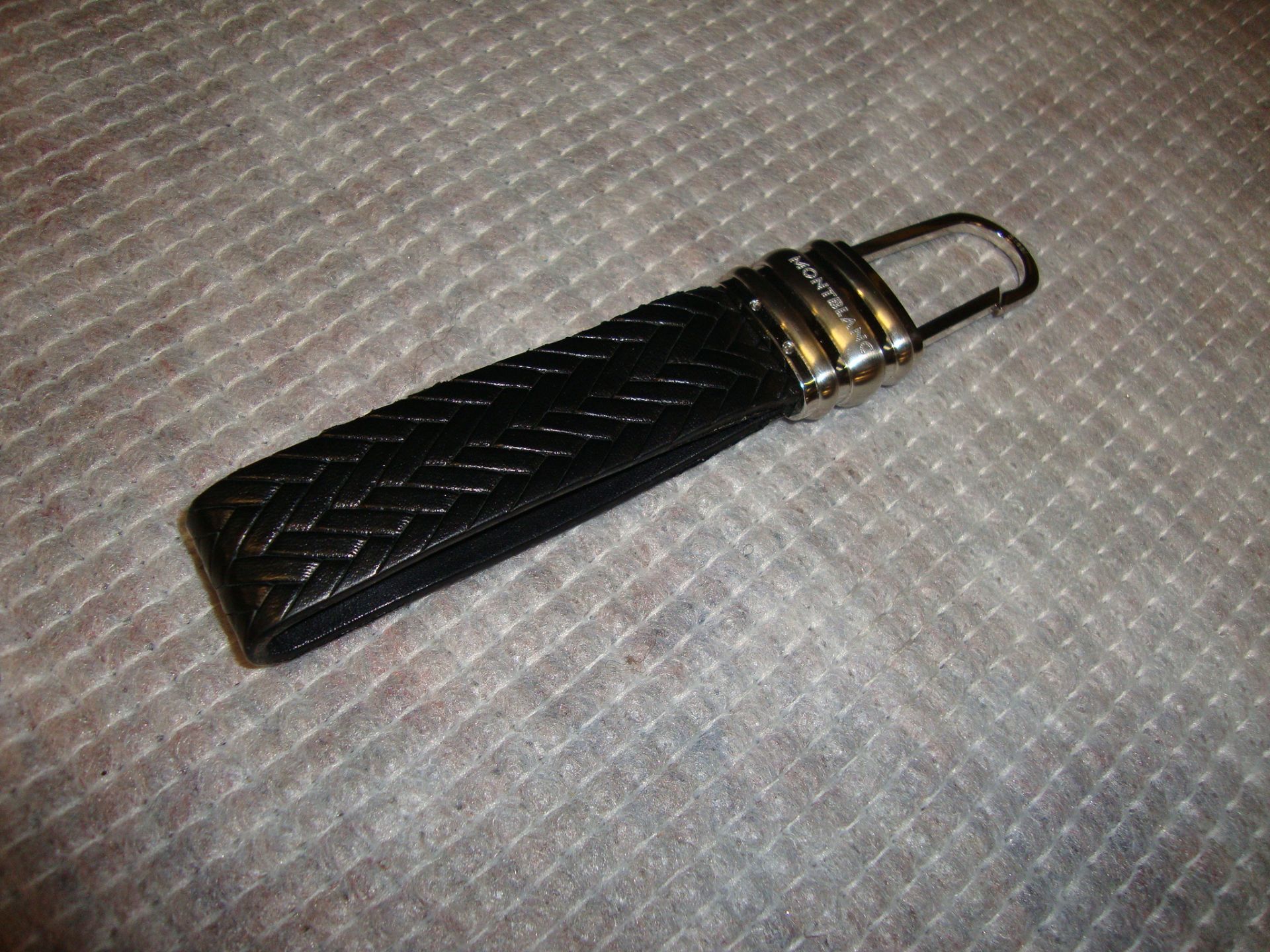 Mont Blanc black leather and silver key fob. Current RRP understood to be circa £125