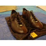 Pair of Gucci dark brown men's leather trainers size 46, with brown suede and gold trim, including