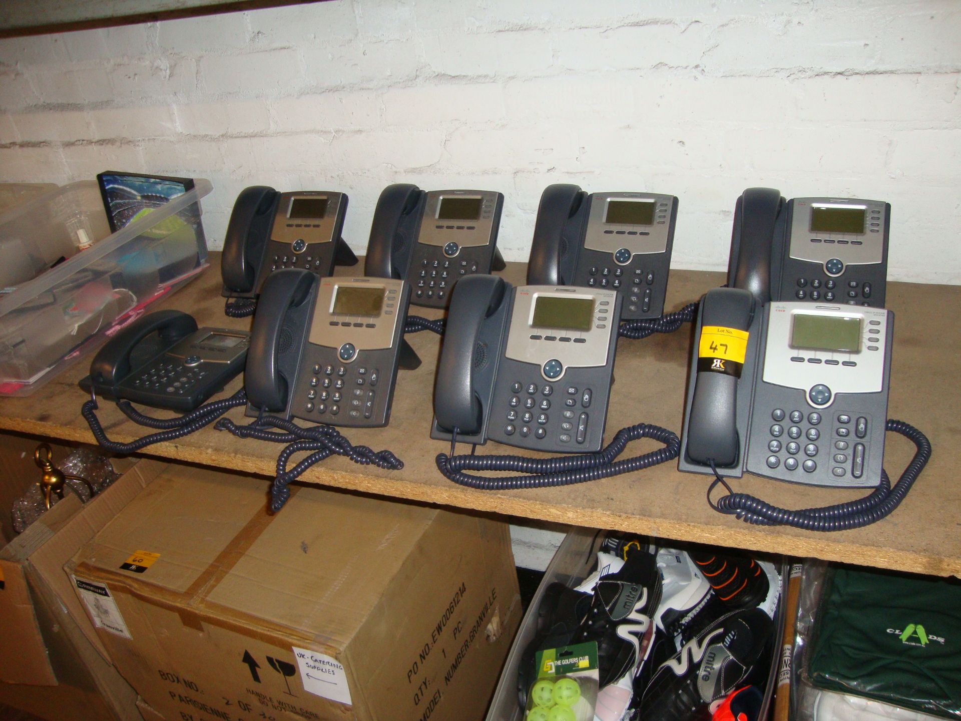 8 off Cisco model SPA504G IP telephone handsets NB. One of the handsets does not include the bracket