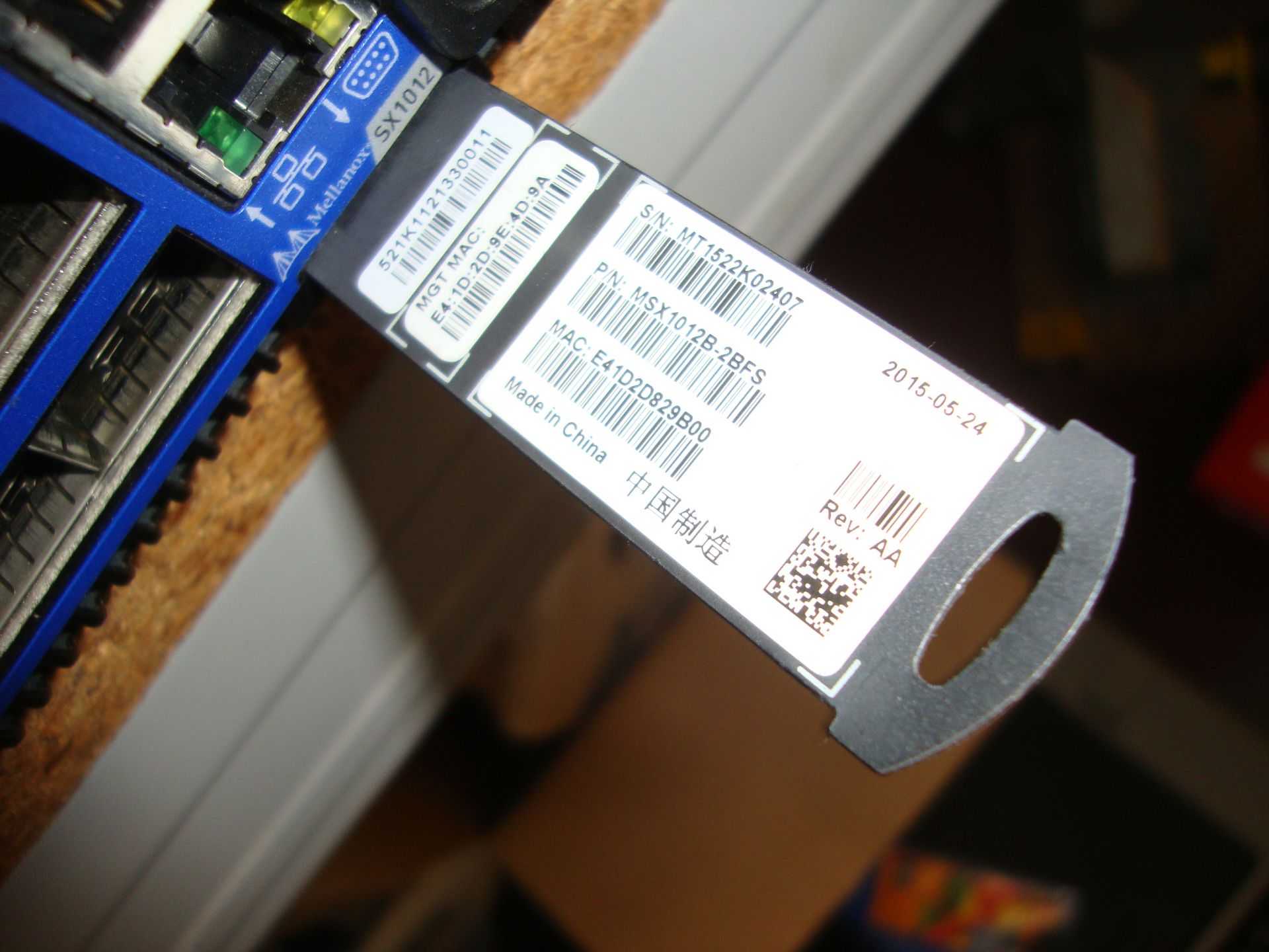 Mellanox model SX1012 switch with dual PSUs and 12xQSFP 40/56Gb ports, serial no. MT1522K02407. This - Image 3 of 5