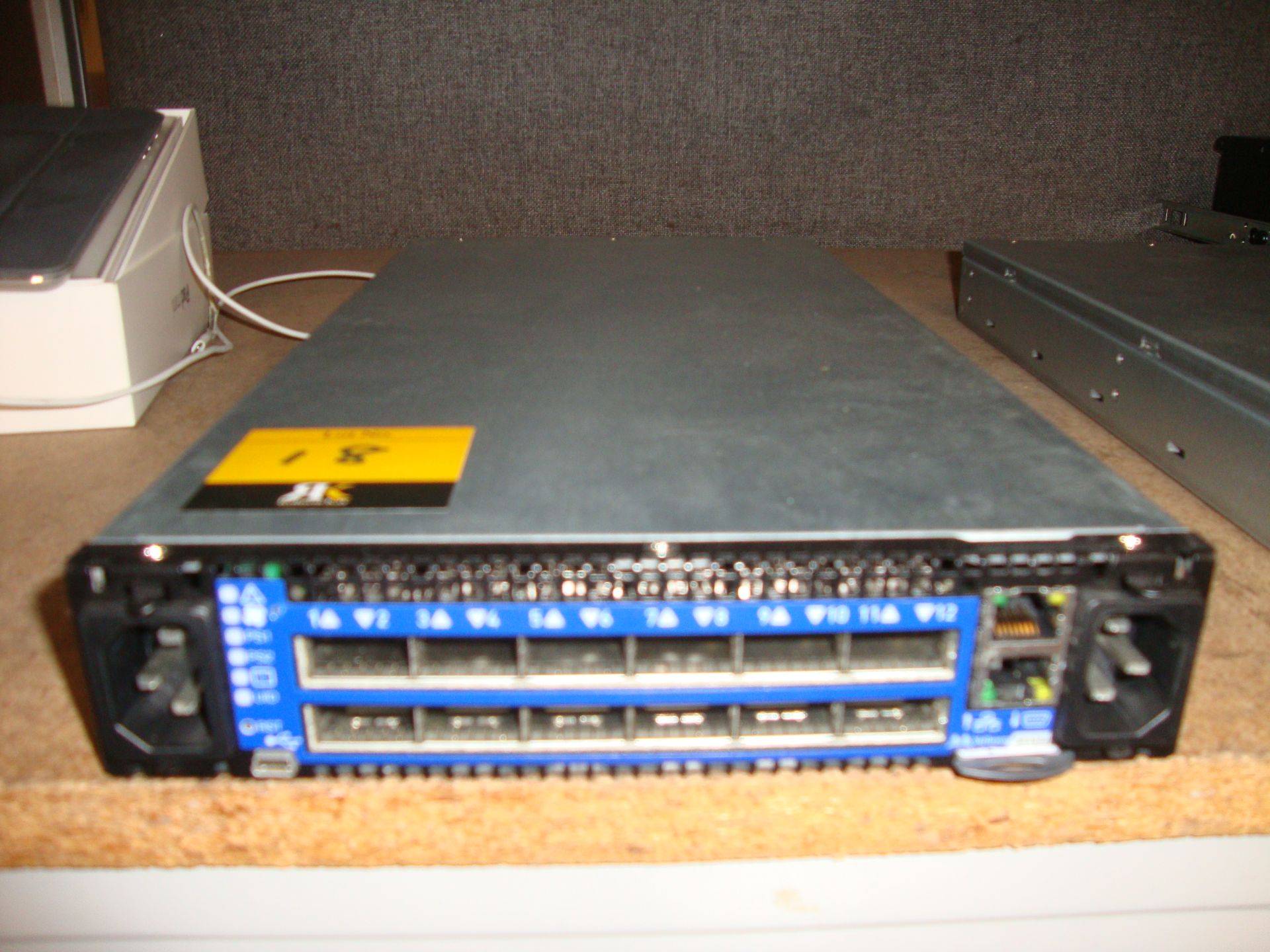 Mellanox model SX1012 switch with dual PSUs and 12xQSFP 40/56Gb ports, serial no. MT1519X01827. This - Image 2 of 6