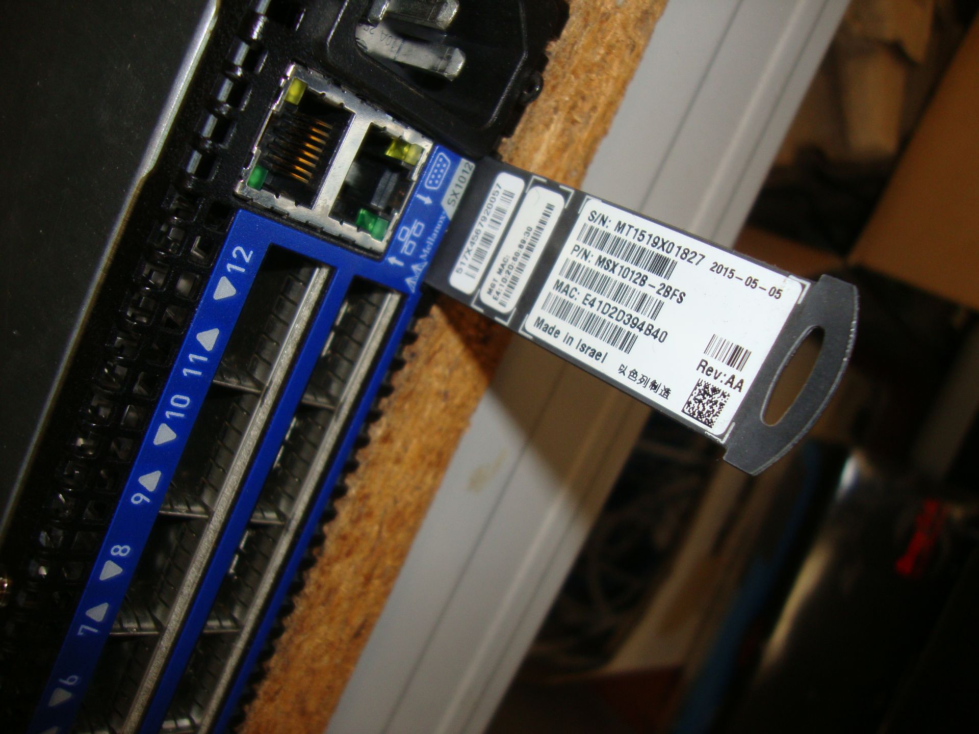 Mellanox model SX1012 switch with dual PSUs and 12xQSFP 40/56Gb ports, serial no. MT1519X01827. This - Image 5 of 6