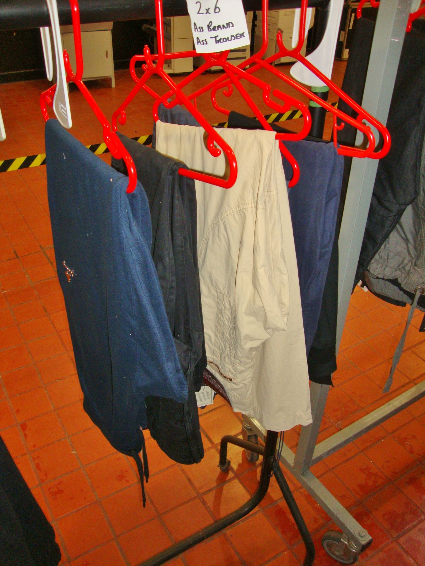 6 assorted pairs of trousers and pants by assorted brands including Moschino, Stone Island, etc