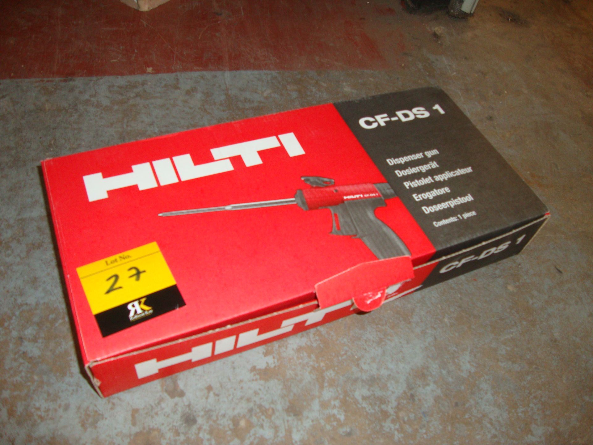 Hilti model CF-DS1 dispenser gun - appears unused. Includes box and instruction booklet/manual