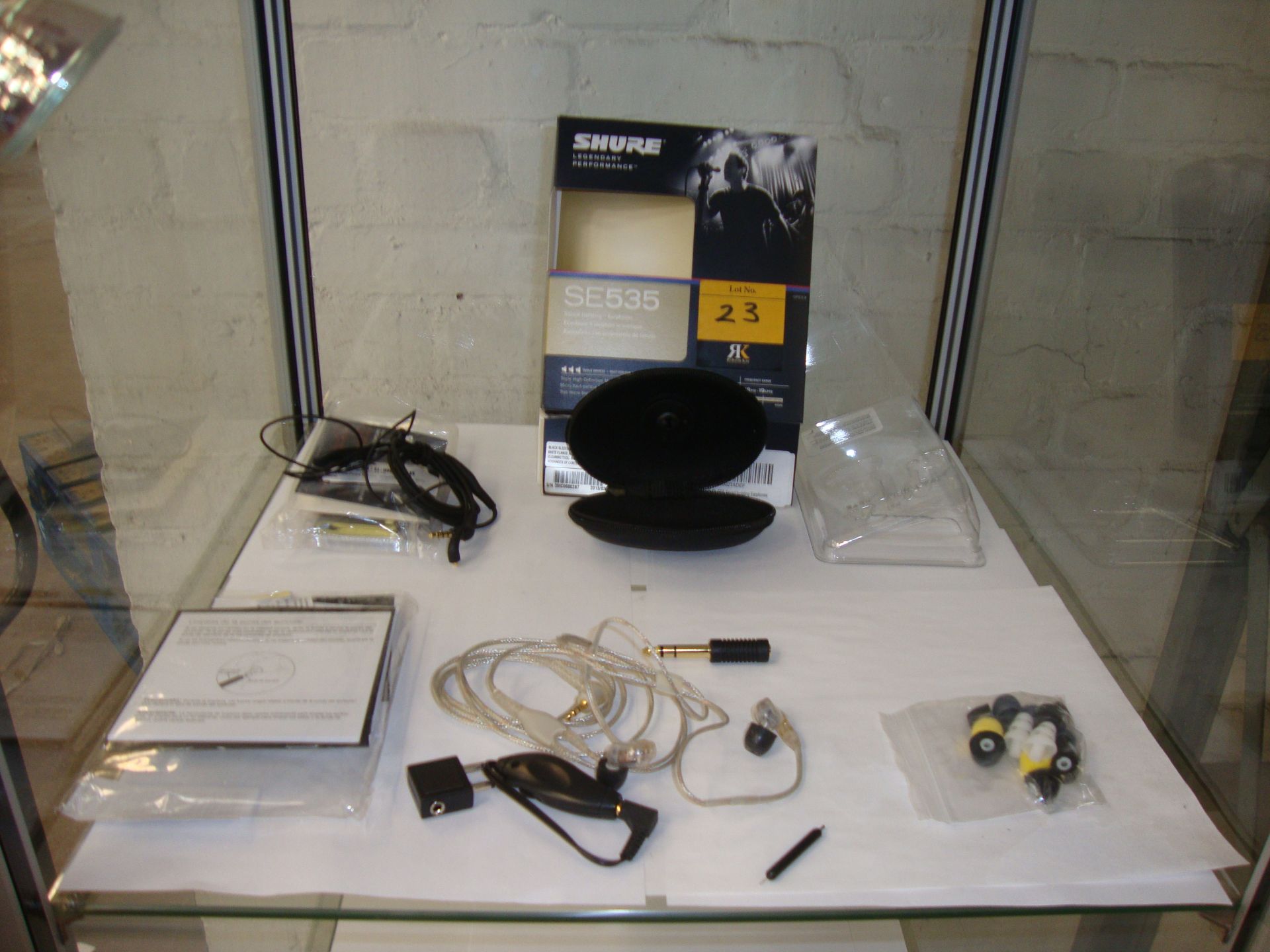 Shure model SE535 sound isolating earphones. This lot includes all of the ancillary items detailed