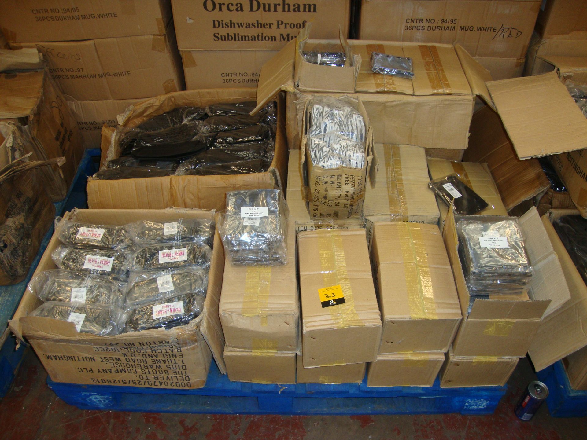 The contents of a pallet of assorted cosmetic/toiletry cases in a variety of colour schemes/styles