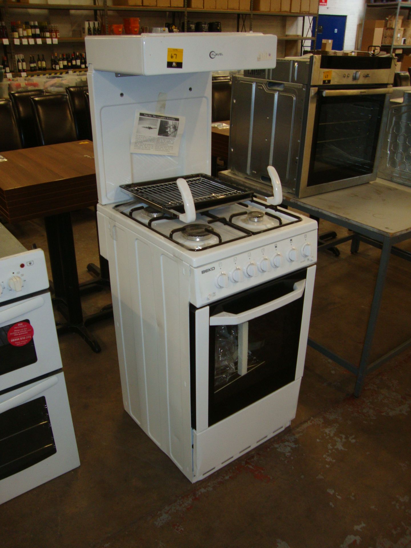 Beko Flavel white floorstanding oven with 4 ring gas burner & overhead grill system - the grill