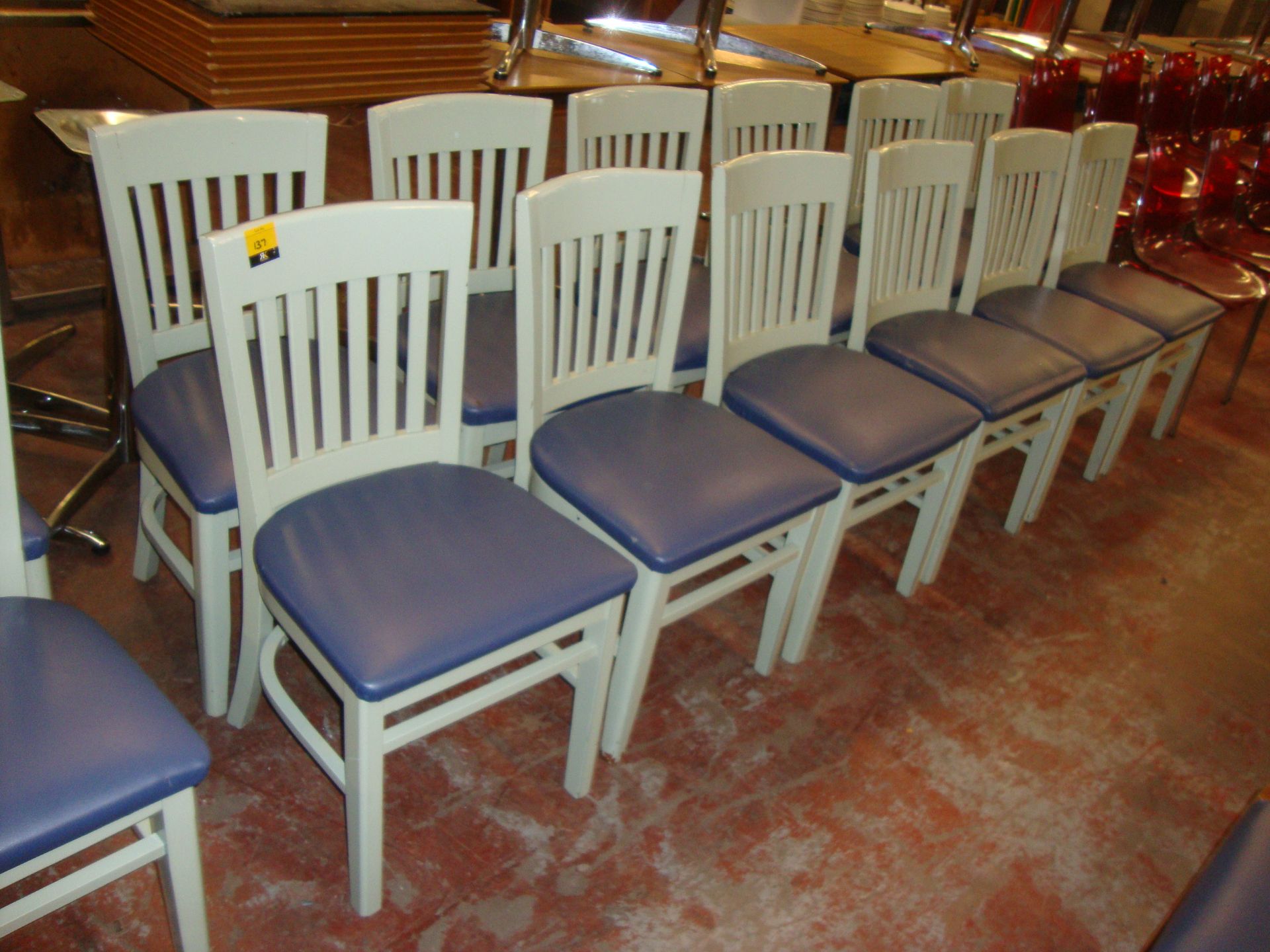 12 off pale green painted wooden chairs with blue upholstered seat bases. NB lots 131 - 137