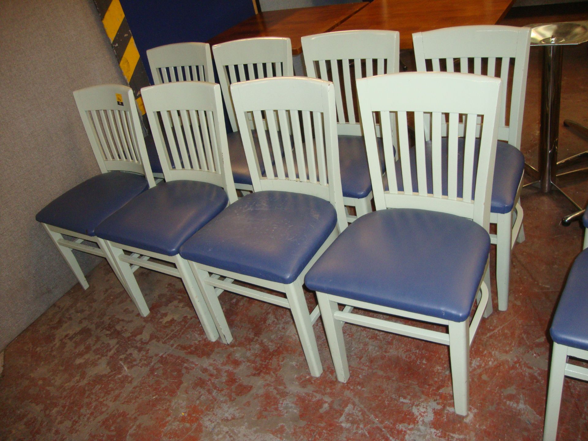 8 off pale green painted wooden chairs with blue upholstered seat bases. NB lots 131 - 137 consist